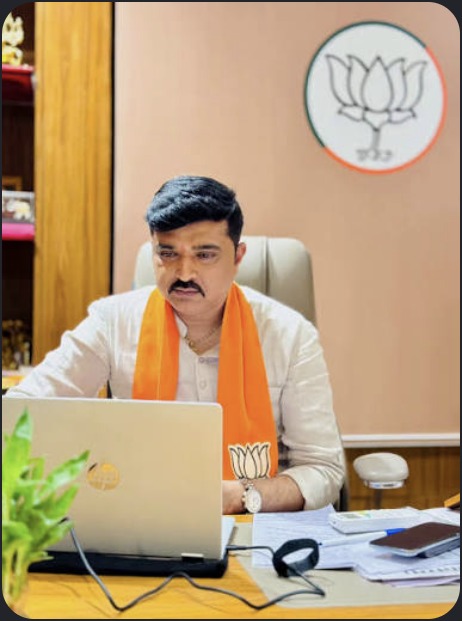 Hardik Tamaliya working at a desk