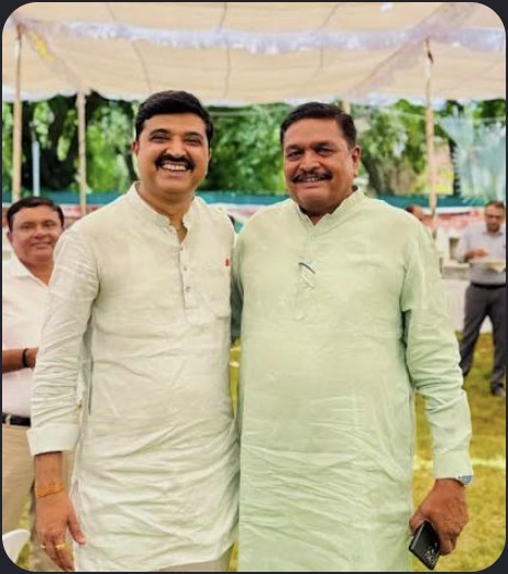 Hardik Tamaliya outdoors with leader