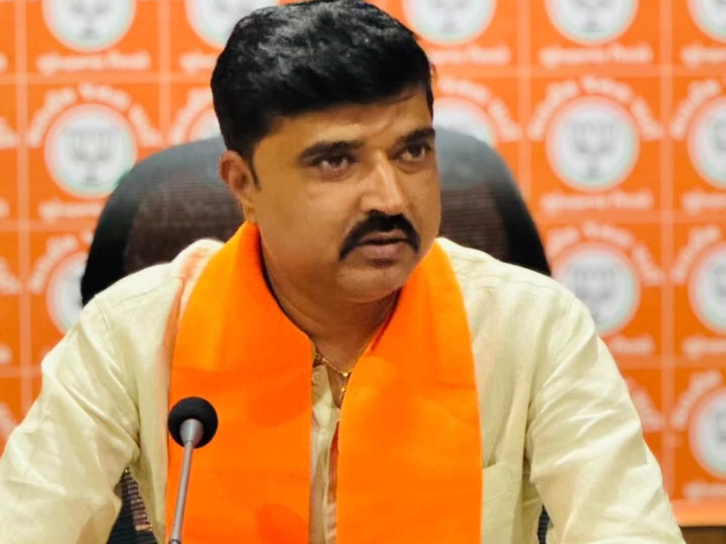 Hardik Tamaliya addressing a BJP Gujarat press briefing